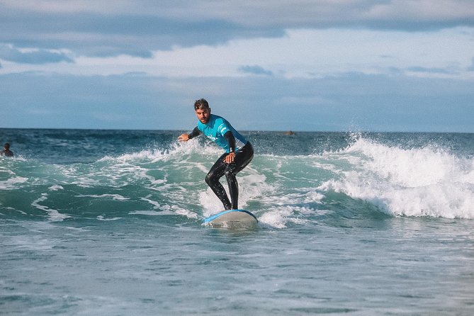 2 Hour Surf Lesson - Te Arai Beach - Gear check: wetsuit, rash shirt, and leash basics