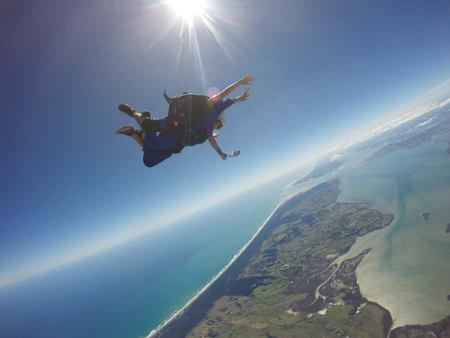Auckland: 13000, 16000, or 18000-Foot Tandem Skydive - Photo and video add-ons: worth it for remembering the sensory chaos