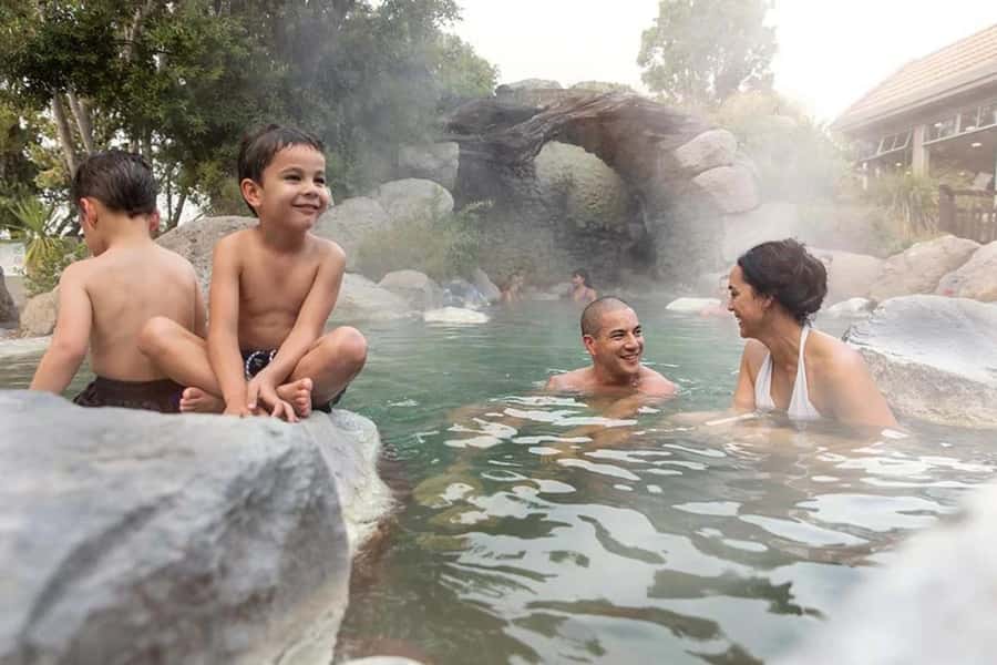 From Auckland: Wai-O-Tapu & Polynesian Spa Rotorua Day Tour - Polynesian Spa: warm mineral pools with Lake Rotorua views
