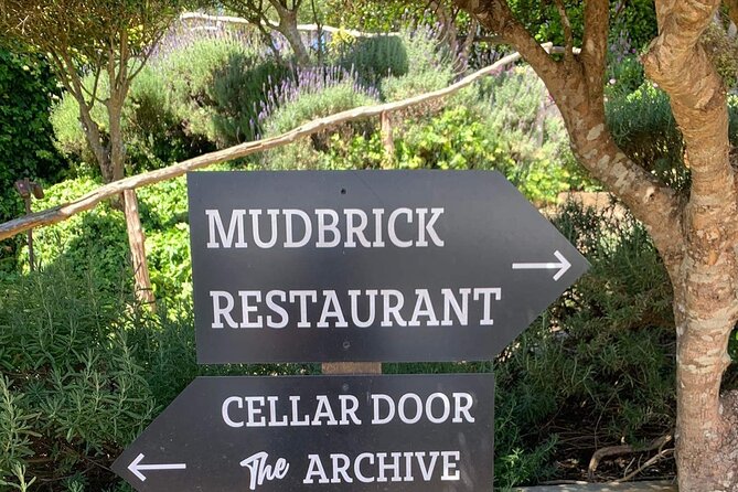 Waiheke Island Wine Tour with Tastings & Gourmet Beachfront Lunch - Stop 2/3 at Stonyridge (or a Swap): Olive Trees, Hot-Weather Scents, and a Different Style