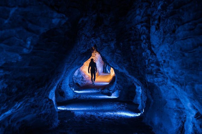 Waitomo Caves Private Tour from Auckland - Boat Glide on the Waitomo River Under a Natural Constellation